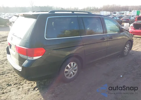 2010 Honda Odyssey Ex-L z USA, uszkodzony, nr VIN 5FNRL3H64AB106589